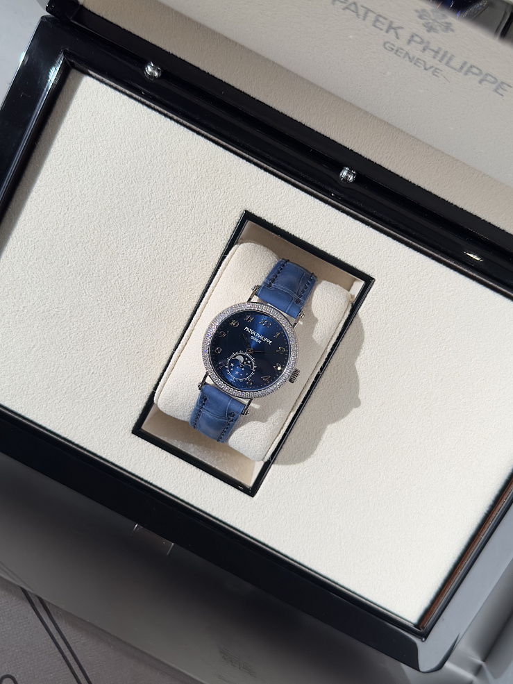 Complications Blue Sunburst Dial Moon Phase Diamond Set Bezel